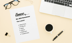 Tan desk with glasses, a coffee cup, a laptop, a paperclip, a pen with the Current logo and Q2 2024 Newsletter text. Tan desk with glasses, a coffee cup, a laptop, a paperclip, a pen with the Current logo and Q2 2024 Newsletter text.