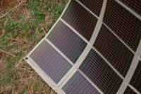 Amorphous silicon thin film foldable solar panel hanging and unfolded