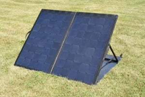 270W PRESS Solar Panel in a field of grass