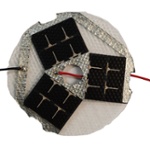 three small Electronic Component Solar Panels wired together