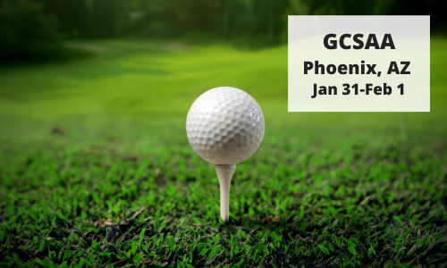 Golf ball on a tee in green grass with text GCSAA Phoeniz, AZ Jan 31-Feb 1