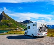 rv parked looking at a mountain